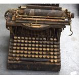 AN ANTIQUE TYPEWRITER, “The Smith Premier Typewriter”. 33 cm wide.