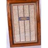 A MIDDLE EASTERN OR ISLAMIC MANUSCRIPT, framed. Total 28.5 cm x 17 cm.