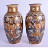 A PAIR OF 19TH CENTURY JAPANESE MEIJI PERIOD SATSUMA VASES painted with immortals. 18 cm high.