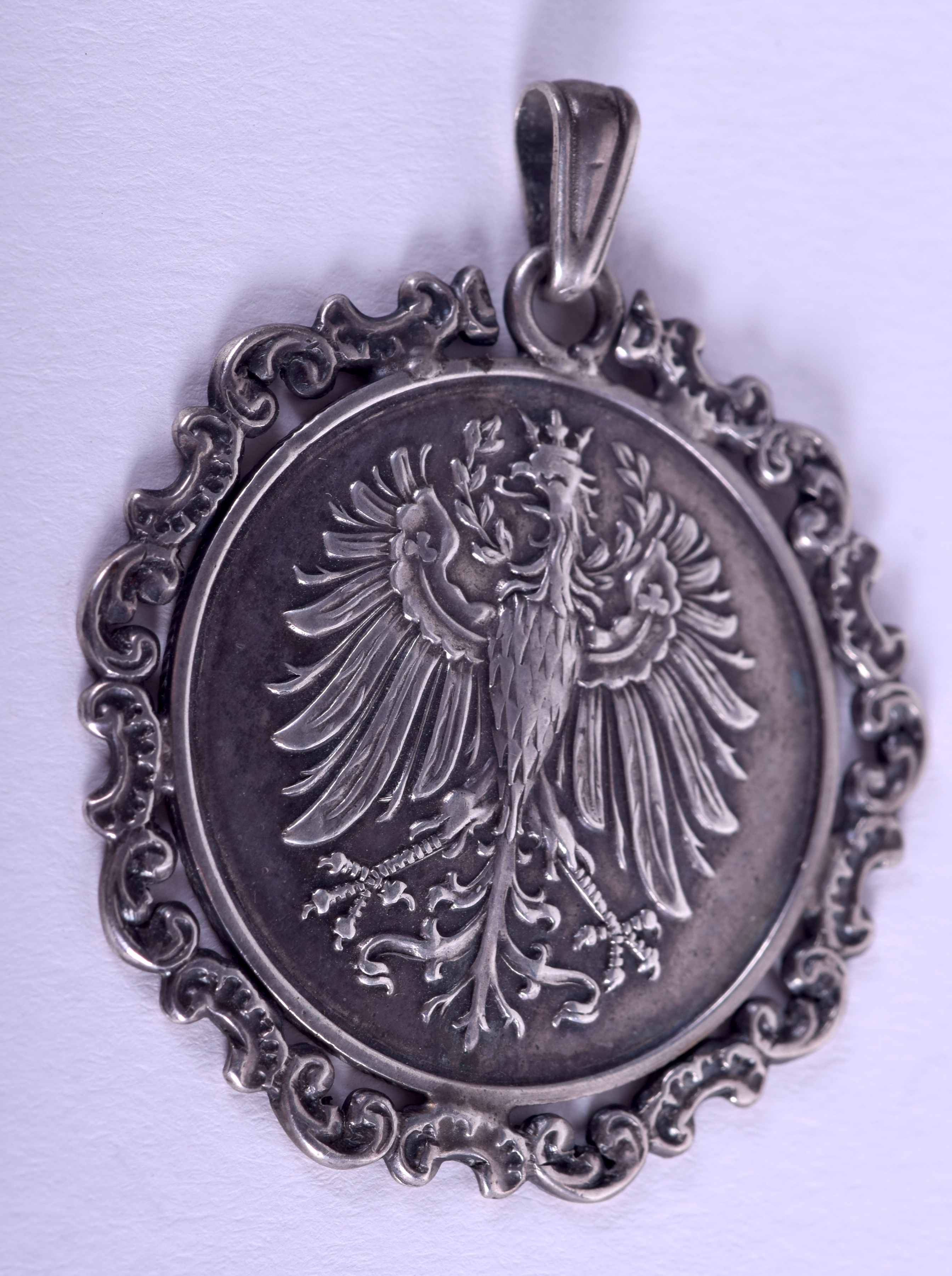 AN ANTIQUE CONTINENTAL SILVER PENDANT possibly Russian. 3.5 cm wide.