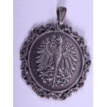 AN ANTIQUE CONTINENTAL SILVER PENDANT possibly Russian. 3.5 cm wide.