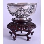 A 19TH CENTURY CHINESE EXPORT SILVER BOWL Qing, upon a hardwood stand. 92 grams. 7 cm wide. (2)