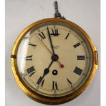 A BRASS SHIPS CLOCK, “Smith Astral”. 20 cm wide.