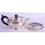 AN ANTIQUE ENGLISH SILVER TEAPOT upon original fitted silver stand. London 1804. 17.5 oz overall. 1