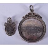 TWO ANTIQUE SILVER MEDALS. (2)