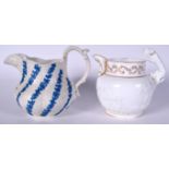 A WHITE SALTGLAZE STONEWARE JUG, together with an early 19th century porcelain example. Largest 27