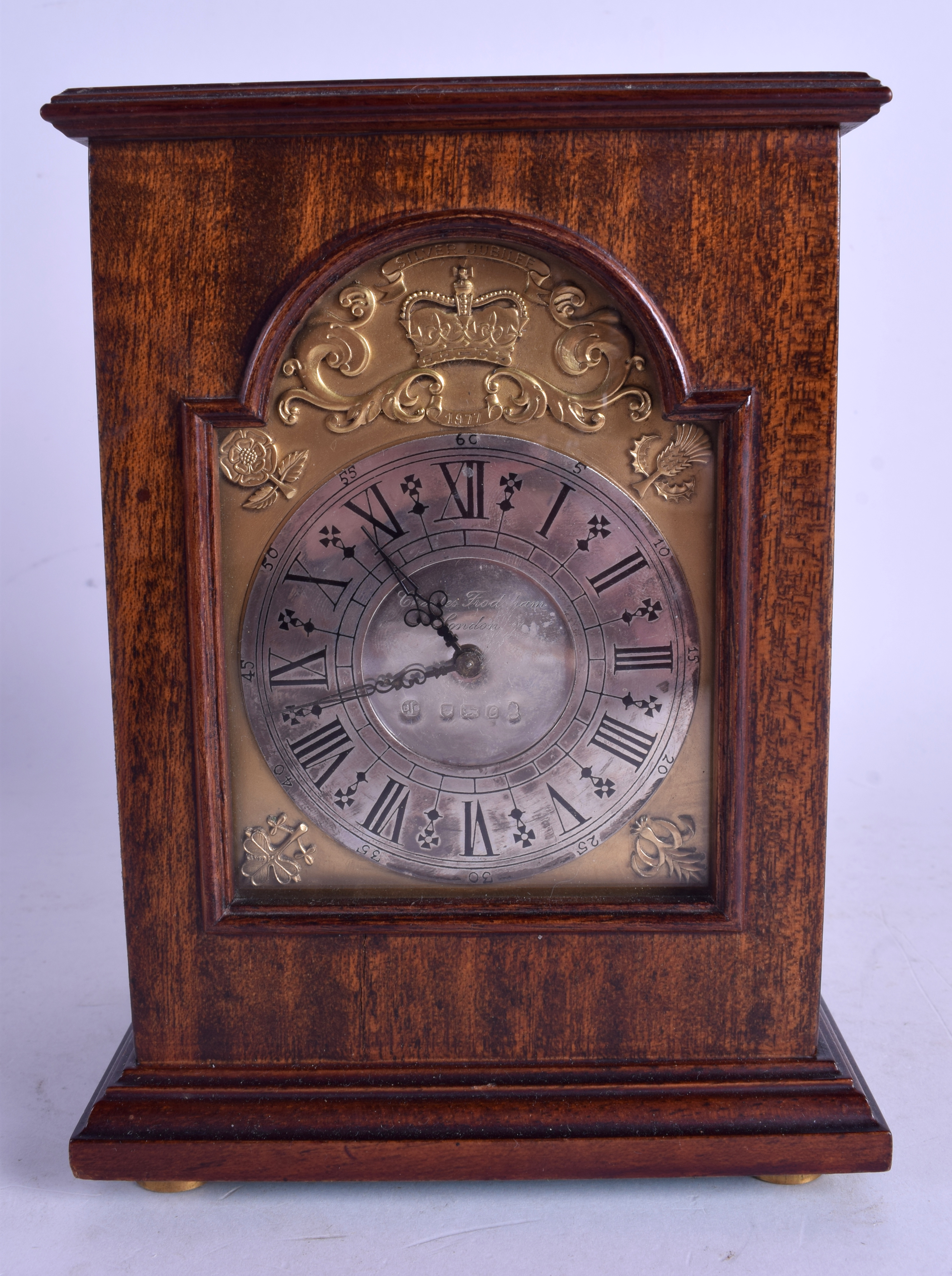 A CHARLES FRODSHAM SILVER MOUNTED MAHOGANY QUEENS JUBILEE MANTEL CLOCK. 19 cm x 13 cm.