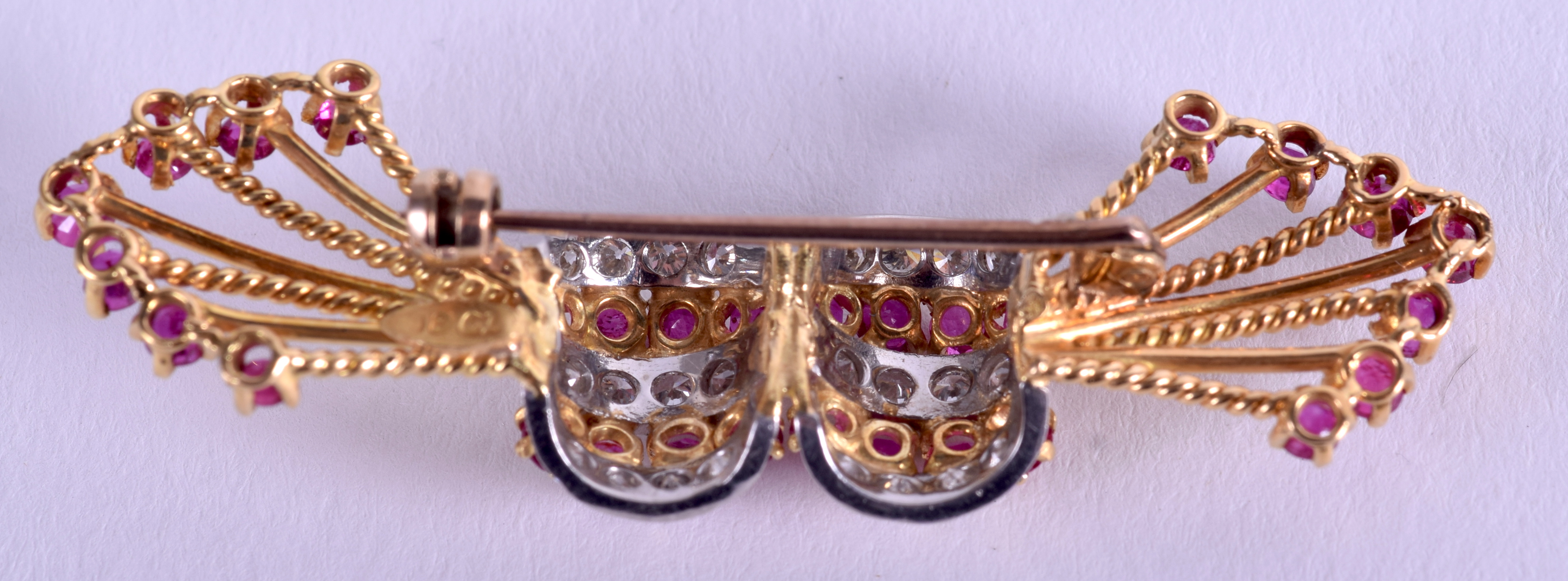 A FINE 1970S 18CT GOLD RUBY AND DIAMOND BROOCH. 8.6 grams. 5.5 cm wide. - Image 2 of 2