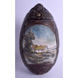 AN EARLY 20TH CENTURY RUSSIAN CARVED AND PAINTED WOODEN EGG AND COVER decorated with a landscape. 2