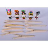 EIGHT PAIRS OF ANTIQUE BONE GLOVE STRETCHERS together with a collection of Indian dolls. (qty)
