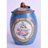 A RARE EARLY 19TH CENTURY FRENCH SEVRES PORCELAIN JAR AND COVER painted with flowers upon a puce gr