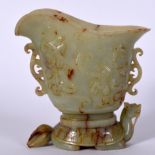 A LARGE CHINESE MUTTON JADE LIBATION CUP, carved with chilong and formed upon the back a mythical t