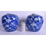 A LARGE PAIR OF 19TH CENTURY CHINESE BLUE AND WHITE GINGER JARS Kangxi style. 24 cm x 18 cm.