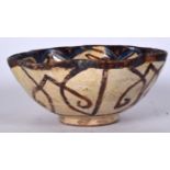 A PERSIAN POTTERY BOWL, lobed in form and painted with figures. 20 cm wide.