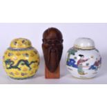 TWO CHINESE PORCELAIN GINGER JARS, together with a wooden bust of a scholar. (3)