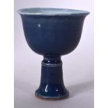 A CHINESE BLUE GLAZED PORCELAIN STEM CUP, Qing. 9 cm high.