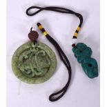 A 20TH CENTURY CHINESE HARDSTONE AND BEETLE NUT PENDANT, together with a malachite pendant. (2)