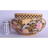 A HUNGARIAN RETICULATED ZSOLNAY PECS POTTERY PLANTER decorated with flowers and vines. 28 cm x 18 c