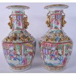 A GOOD PAIR OF 19TH CENTURY CHINESE CANTON FAMILLE ROSE CHILONG VASES Qing, painted with figures. 3