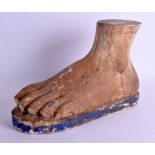 A LARGE 19TH CENTURY CARVED AND PAINTED WOOD GRAND TOUR FIGURE OF A FOOT. 38 cm x 26 cm.
