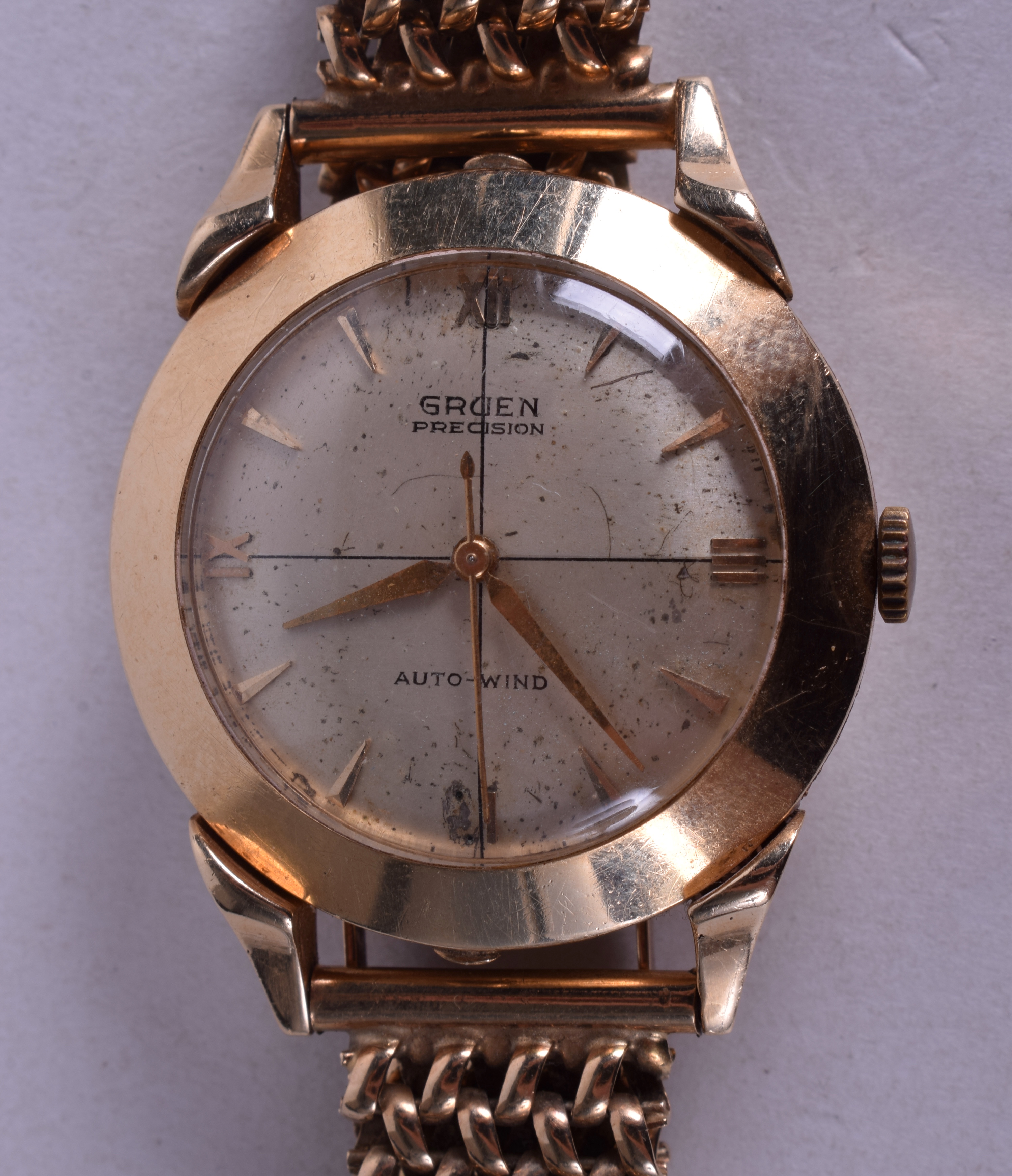 A VINTAGE 14CT GRUEN PRECISION AUTO WIND WRISTWATCH with 9ct gold strap. 44.5 grams overall. 3 cm w