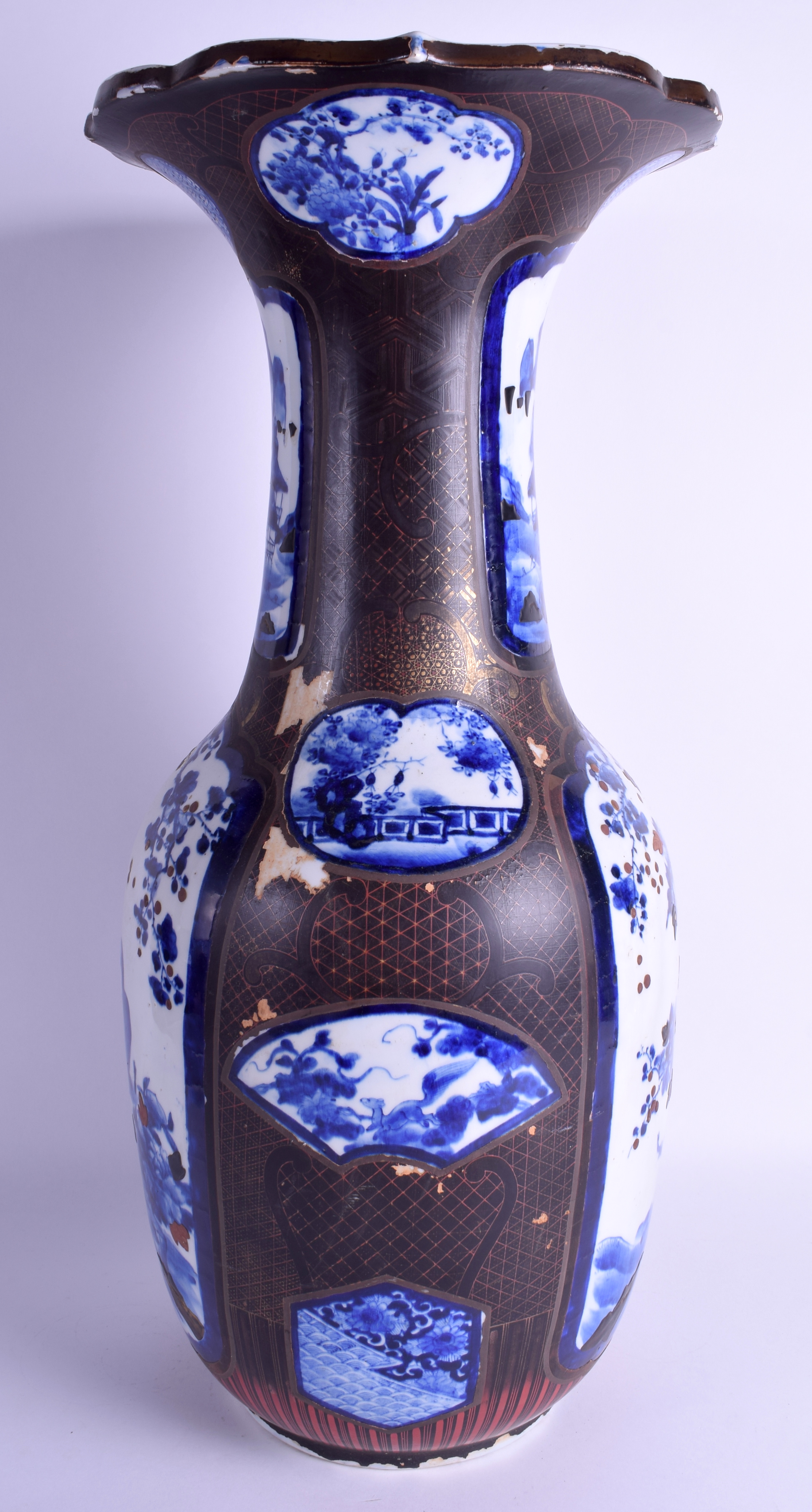 A LARGE 19TH CENTURY JAPANESE MEIJI PERIOD BLUE AND WHITE VASE lacquered with black and red motifs. - Image 2 of 6