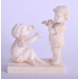 A 19TH CENTURY BAVARIAN CARVED IVORY GROUP OF MUSICIANS. 5 cm x 5.75 cm.