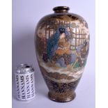 A LARGE 19TH CENTURY JAPANESE MEIJI PERIOD SATSUMA VASE painted with samurai fighting within landsc