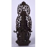 A 20TH CENTURY BRONZE BUDDHA, formed upon a reticulated shrine. 21.5 cm high.