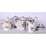 THREE NEW HALL PORCELAIN TEA POTS, together with a tea bowl and saucer etc. (qty)