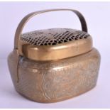 A 19TH CENTURY CHINESE BRASS HAND WARMER AND COVER bearing Xuande marks to base. 399 grams. 13 cm x