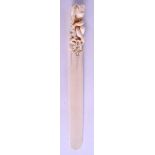 A GOOD 19TH CENTURY EUROPEAN DIEPPE IVORY LETTER OPENER carved with a putti holding foliage. 30 cm