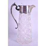 AN EDWARDIAN SILVER AND CUT GLASS CLARET JUG. Sheffield 1907. 26 cm high.