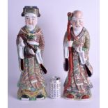 A LARGE PAIR OF CHINESE REPUBLICAN PERIOD FAMILLE ROSE FIGURES painted with foliage. 49 cm high.