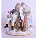 A 19TH CENTURY GERMAN MEISSEN PORCELAIN FIGURAL GROUP depicting a male and female. 14 cm x 16 cm.