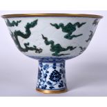 A CHINESE BLUE AND WHITE PORCELAIN STEM BOWL BEARING XUANDE MARKS, painted with a dragon amongst th