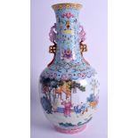 AN EARLY 20TH CENTURY CHINESE FAMILLE ROSE VASE Guangxu, bearing Qianlong marks to base, painted wi