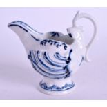 AN 18TH CENTURY DERBY DOLPHIN AND SHELL MOULDED EWER painted in underglaze blue. 9 cm wide.