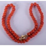 AN 18CT GOLD AND CORAL NECKLACE. 38 grams. 42 cm long.