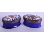 TWO 18TH CENTURY BATTERSEA BILSTON ENAMEL PILL BOXES. 4.5 cm wide. (2)