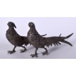 A PAIR OF WHITE METAL PHEASANTS, formed standing. 27 cm wide.