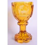 A 19TH CENTURY BOHEMIAN SMOKEY AMBER GLASS GOBLET. 19.5 cm high.