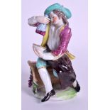 A 19TH CENTURY CONTINENTAL CHELSEA STYLE PORCELAIN FIGURE modelled as a male holding a bowl. 12 cm