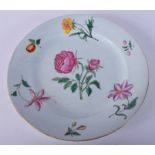 A FINE 18TH CENTURY CHINESE LONDON DECORATED FAMILLE ROSE PLATE Qianlong, painted with botanical sp