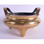 A 19TH CENTURY CHINESE TWIN HANDLED BRONZE CENSER bearing Xuande marks to base. 23 cm wide, interna