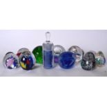 A GROUP OF GLASS PAPERWEIGHTS, varying form. (13)