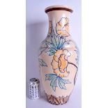 A VERY LARGE ART DECO ROYAL CAULDON SLIP DECORATED VASE painted with flowers. 49 cm high.