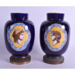 A PAIR OF 19TH CENTURY VIERZON JEAN FRENCH FAIENCE VASES painted with portraits. 20 cm high.