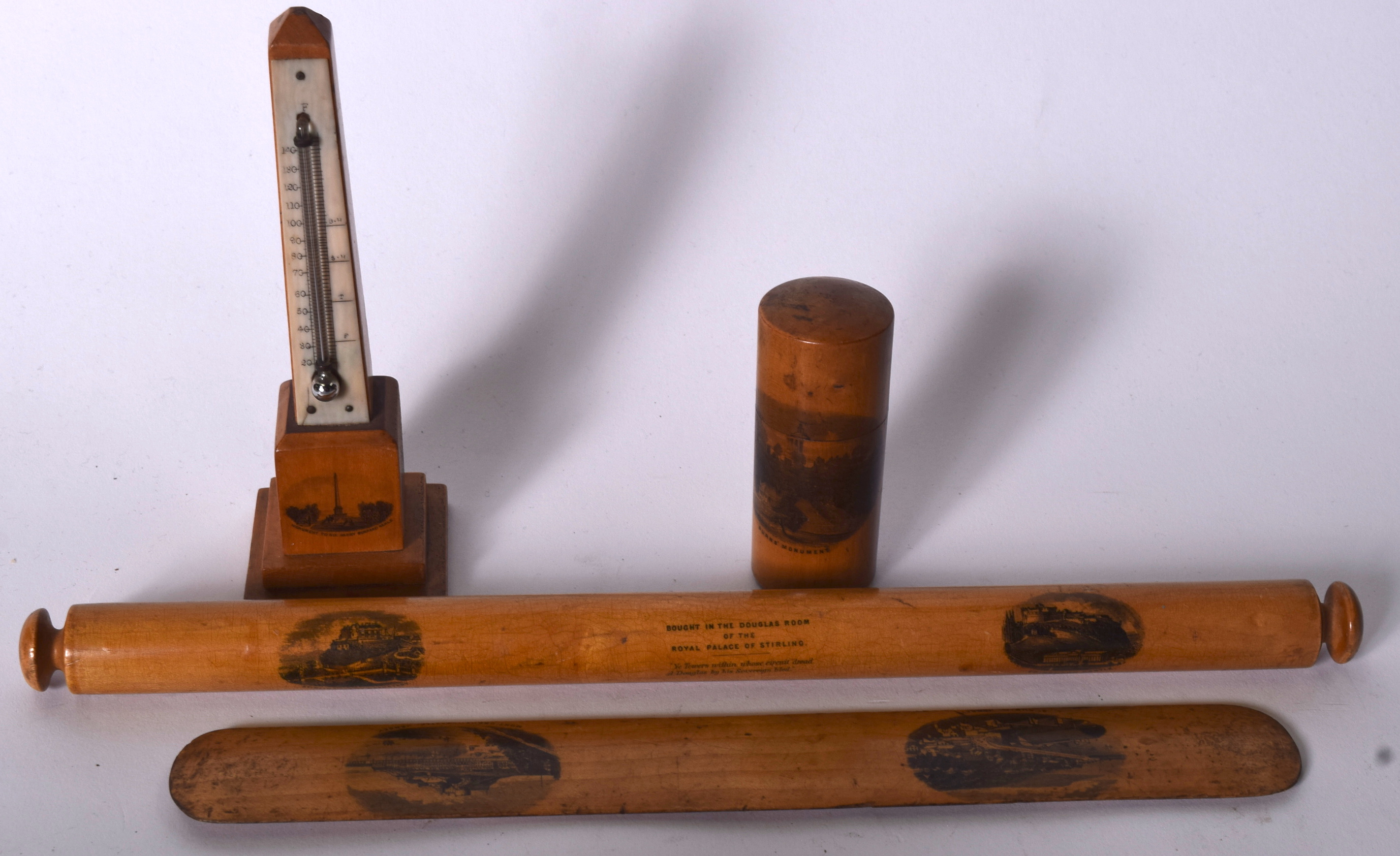 A SCOTTISH SOUVENIR WARE ROLLING PIN, together with three other objects. (4)