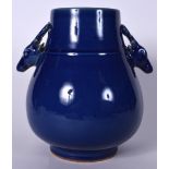 A LARGE CHINESE BLUE GROUND PORCELAIN HU VASE, formed with deer head handles, paper label to base.